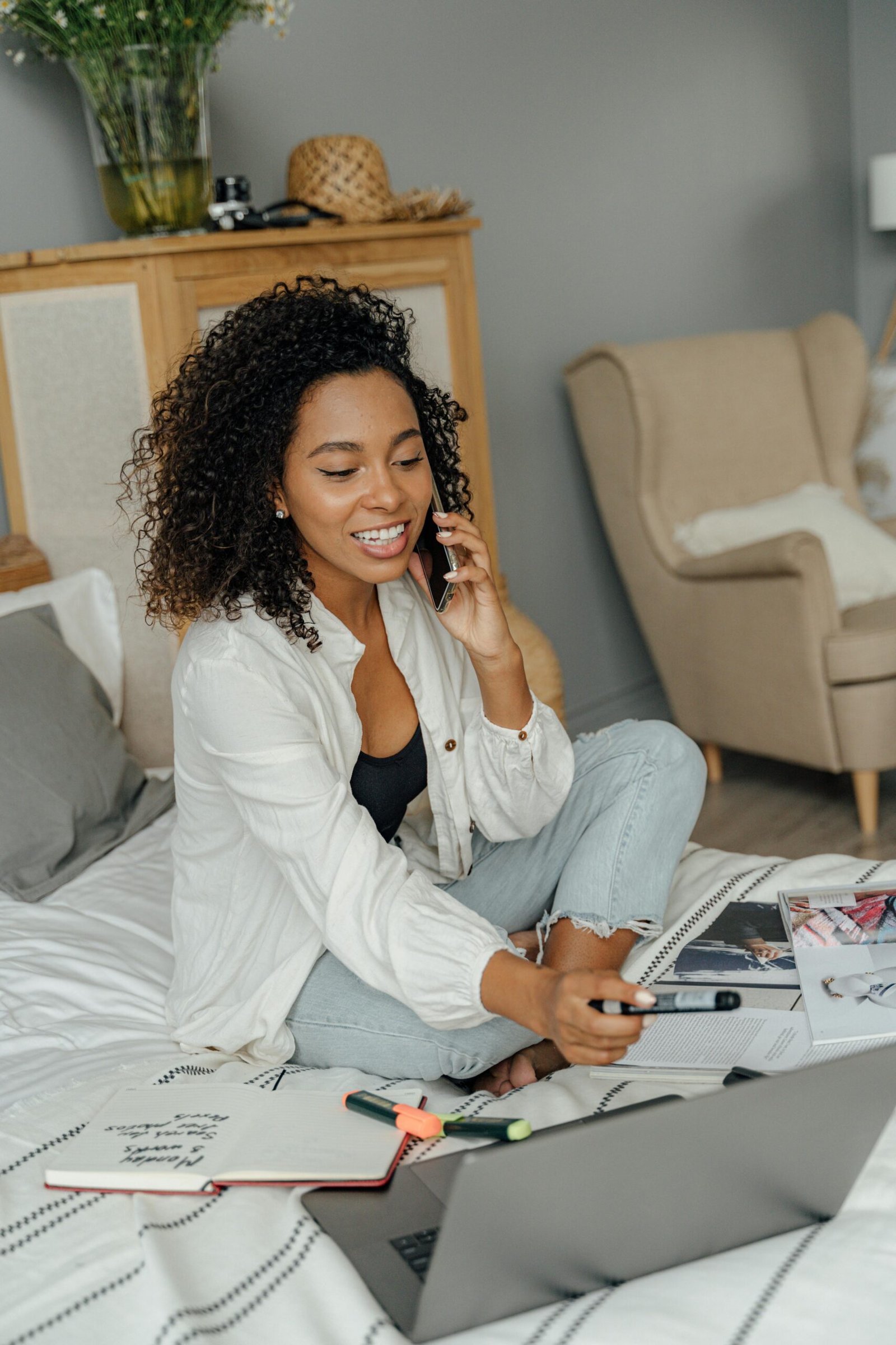 A Woman Talking into Smartphone